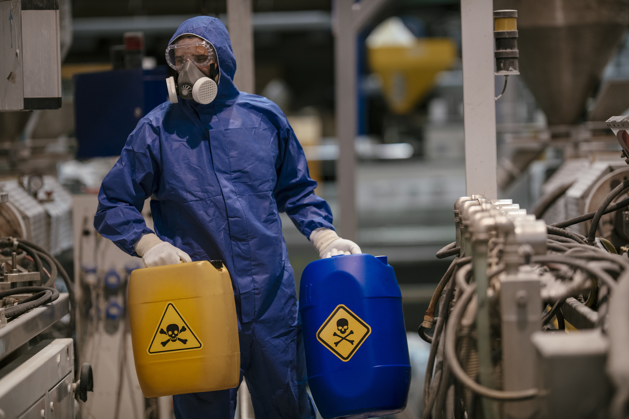 A man Safely Handle Hazardous Chemicals